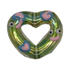 Green clear acrylic heart with blue and pink eyes