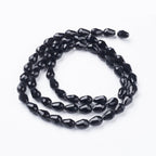 Black Glass Beads - Faceted Drop - 11x8mm - Appx 57 per strand