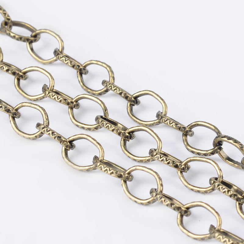 Antique Bronze Iron Cable Chain - Textured - Unwelded - Flat Oval - Nickel Free - 8x6x1mm - 1 meter per bag