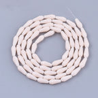 Opaque Glass Beads - Faceted Teardrop - 9-10x4mm - Appx 70 per strand