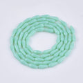 Aquamarine Opaque Glass Beads - Faceted Teardrop - 9-10x4mm - Appx 70 per strand
