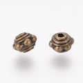 Tibetan Style Antique Bronze Alloy Spacer Bead - Lead & Cadmium Free - 7x5.5mm - 25 per bag