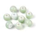 Handmade Honeydew Porcelain Beads - Round - 6-7x5-6mm - 10 per bag