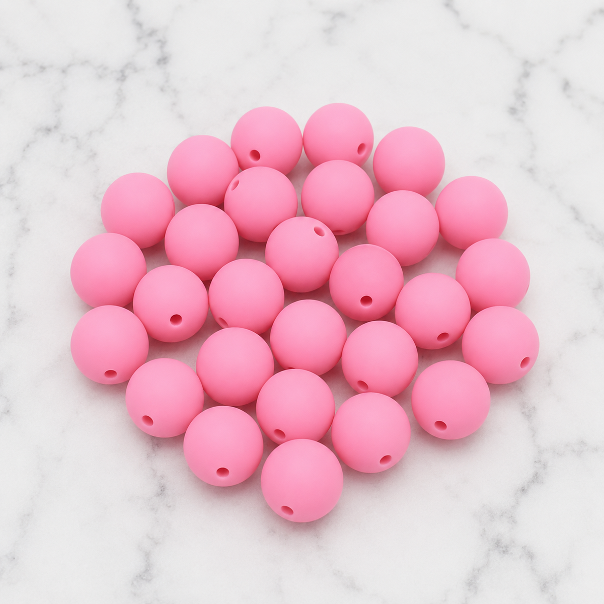 Five-pack of soft strawberry pink 9mm round silicone beads