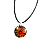 Flower Burst with Black Background Glass Necklace