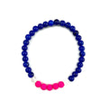 Dark Blue Glass and Hot Pink Lava Stone Bracelet